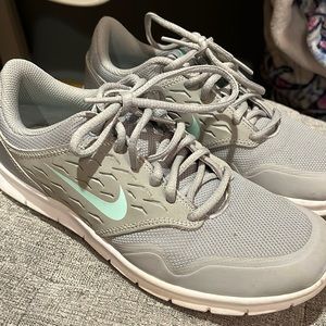 Grey and mint green Nike shoes